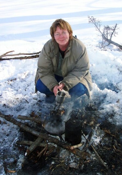 The first order of business is to build a fire in the snow.  Hotdogs, beans and coffee fill the menu.