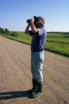 August 10, 2004 - Landowner and biologist Wayne Roberts checks out the wildlife on a daily basis.  His neighbours across the road keep cattle and horses.