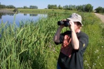 August 10, 2004 - The lake spans two 80 acre parcels of land, and in high water years, the water flows onto the land on the other side of the road.