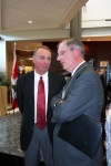 EEDC President Allan Scott confers with U of A's Peter Robertson at TEC Edmonton Launch