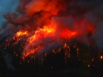 This is a picture of a prescribed fire in Kootenay
National Park during 2001. Photo credit- Parks Canada