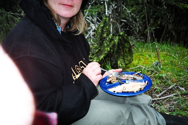 August 20, 2005 - Moi (aka Rubberboots, my new handle given to me by Pizza Man at The Zoo) eating breakfast at Pepper's Lake.  The trout here were as pink as salmon, and just as tasty, if not more so.